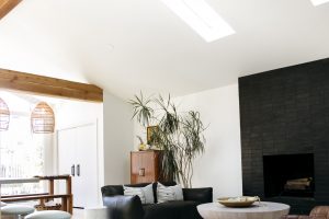The living area of a home with a rectangular skylight 